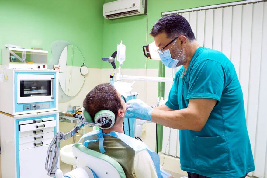 dentist performs dental implants in Aventura