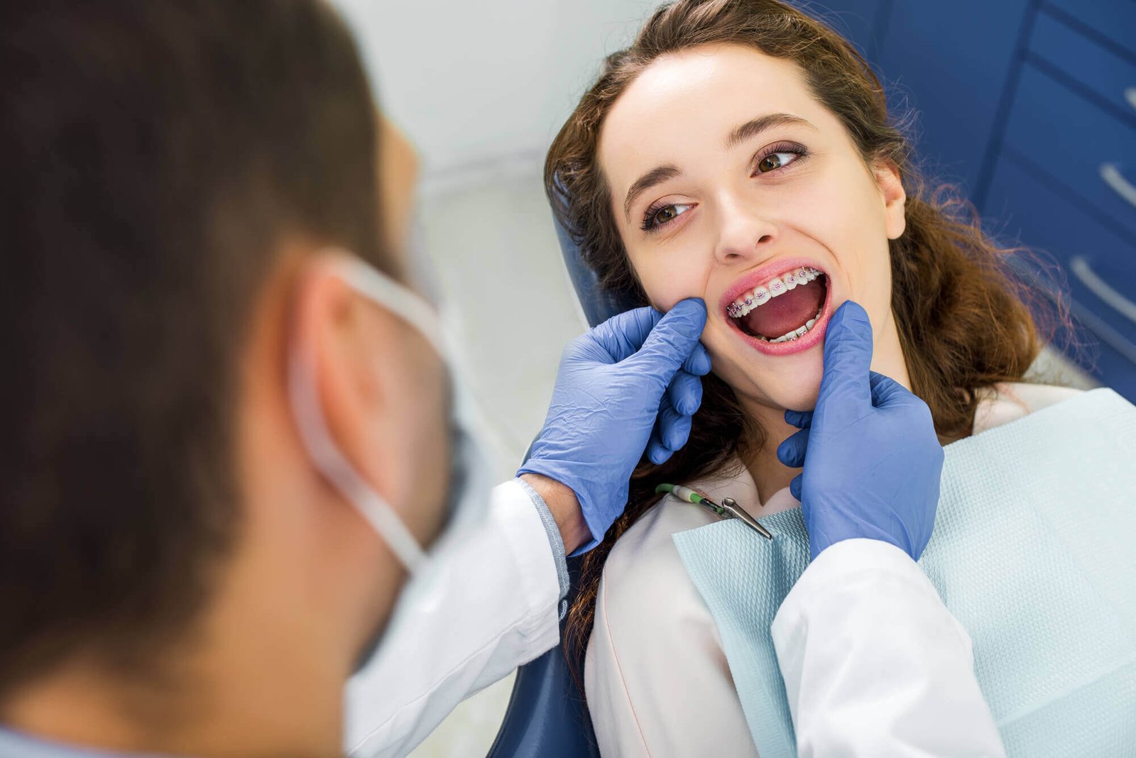 Orthodontist North Miami examining a patient