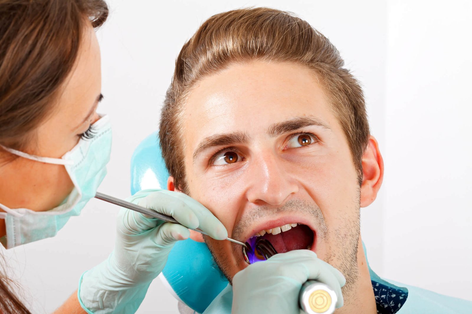 an Emergency Dentist in north Miami treating patient